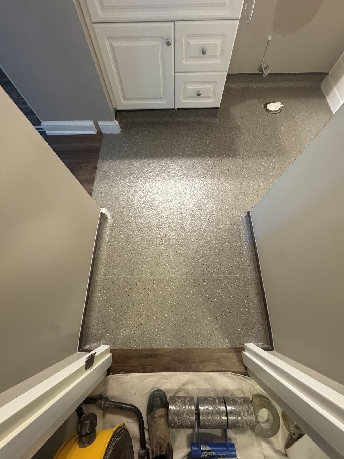 Gray sheet-vinyl bathroom