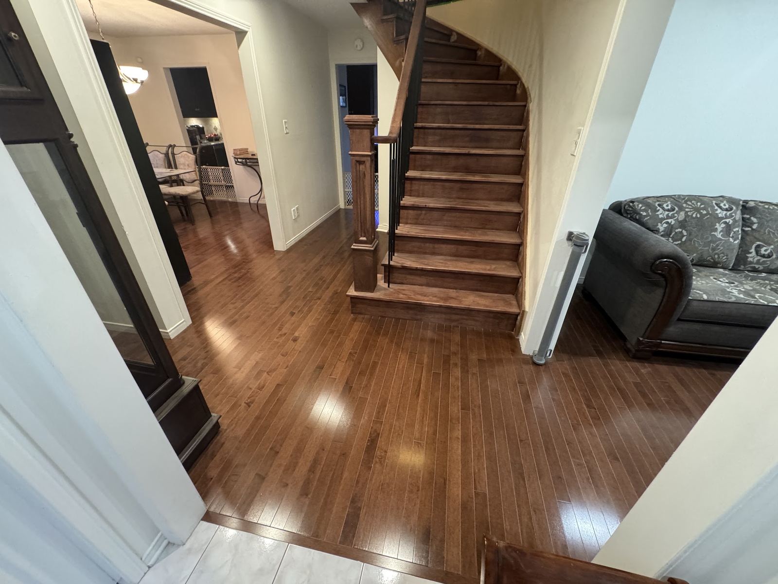 Dark hardwood room and stairs