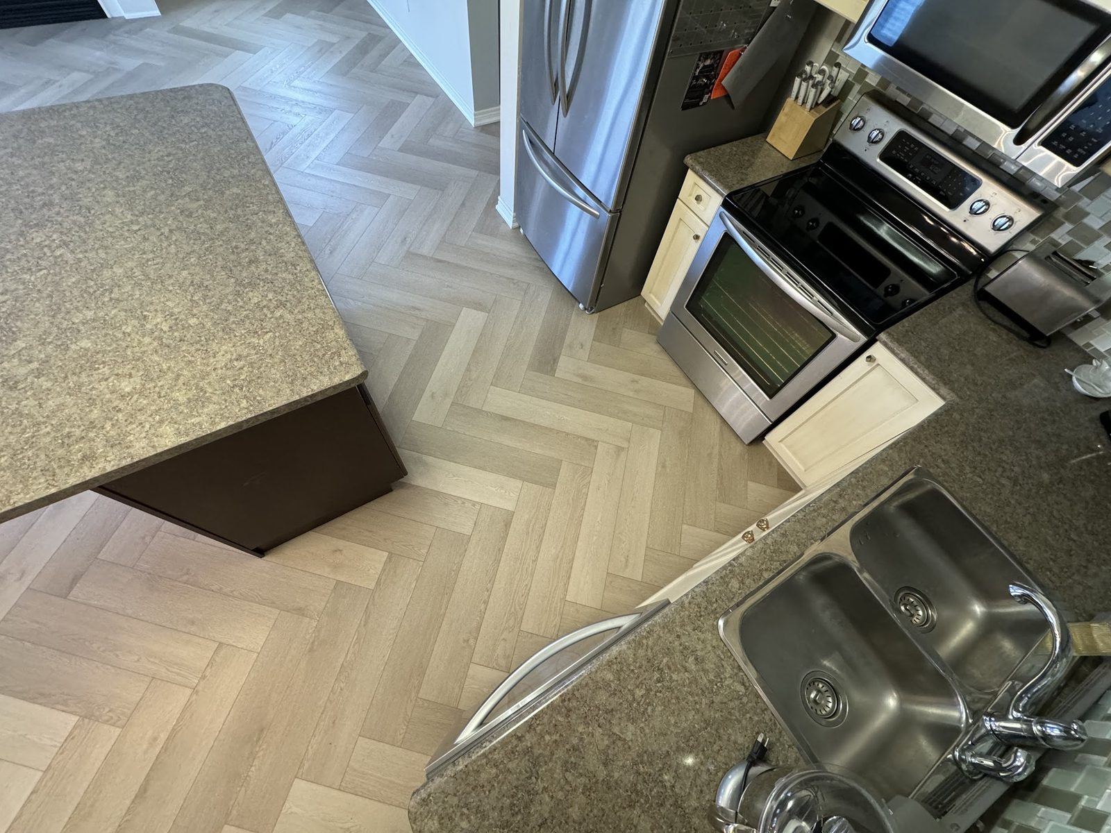 LVP herringbone kitchen