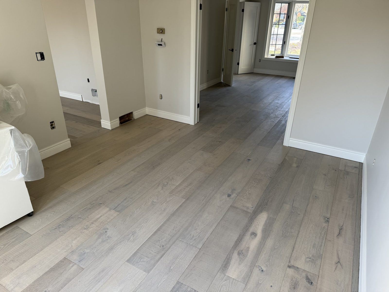 Hardwood hallway and rooms