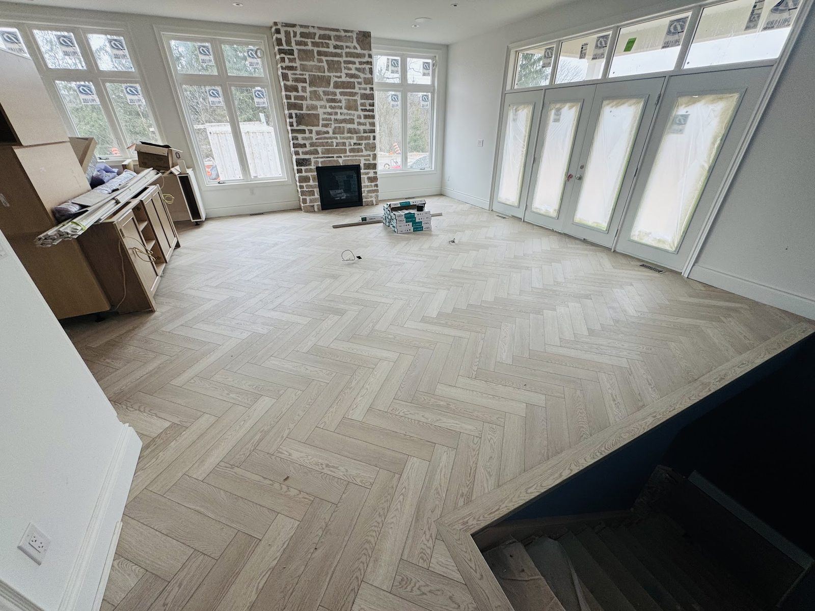 LVP herringbone with fireplace