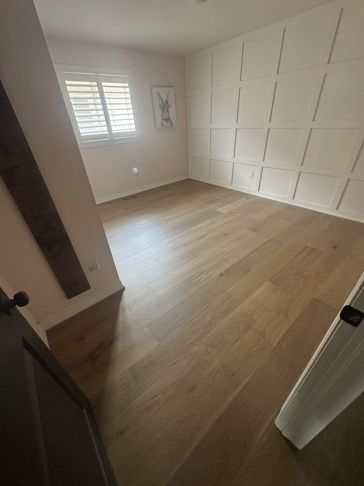 Warm oak hardwood bedroom