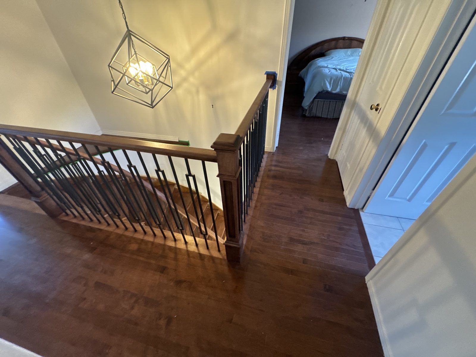 Dark hardwood at stair landing