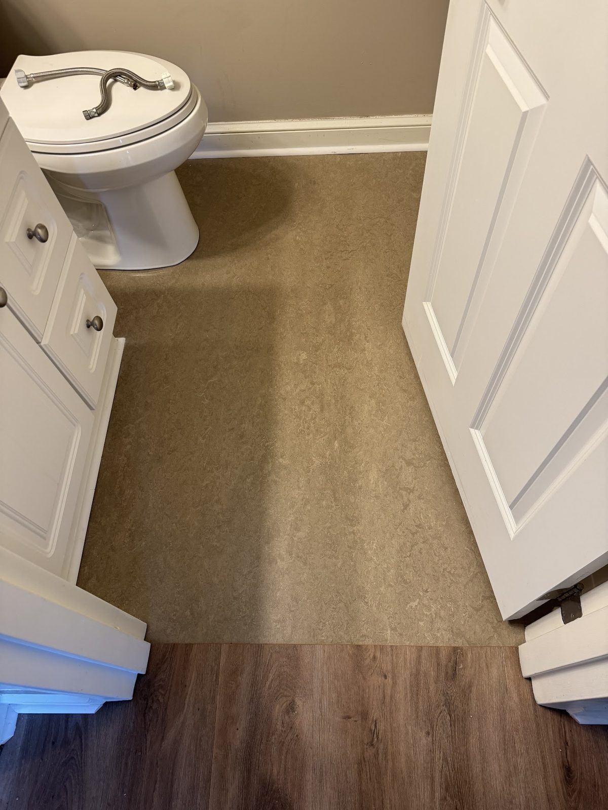 Heat-weld sheet vinyl powder room