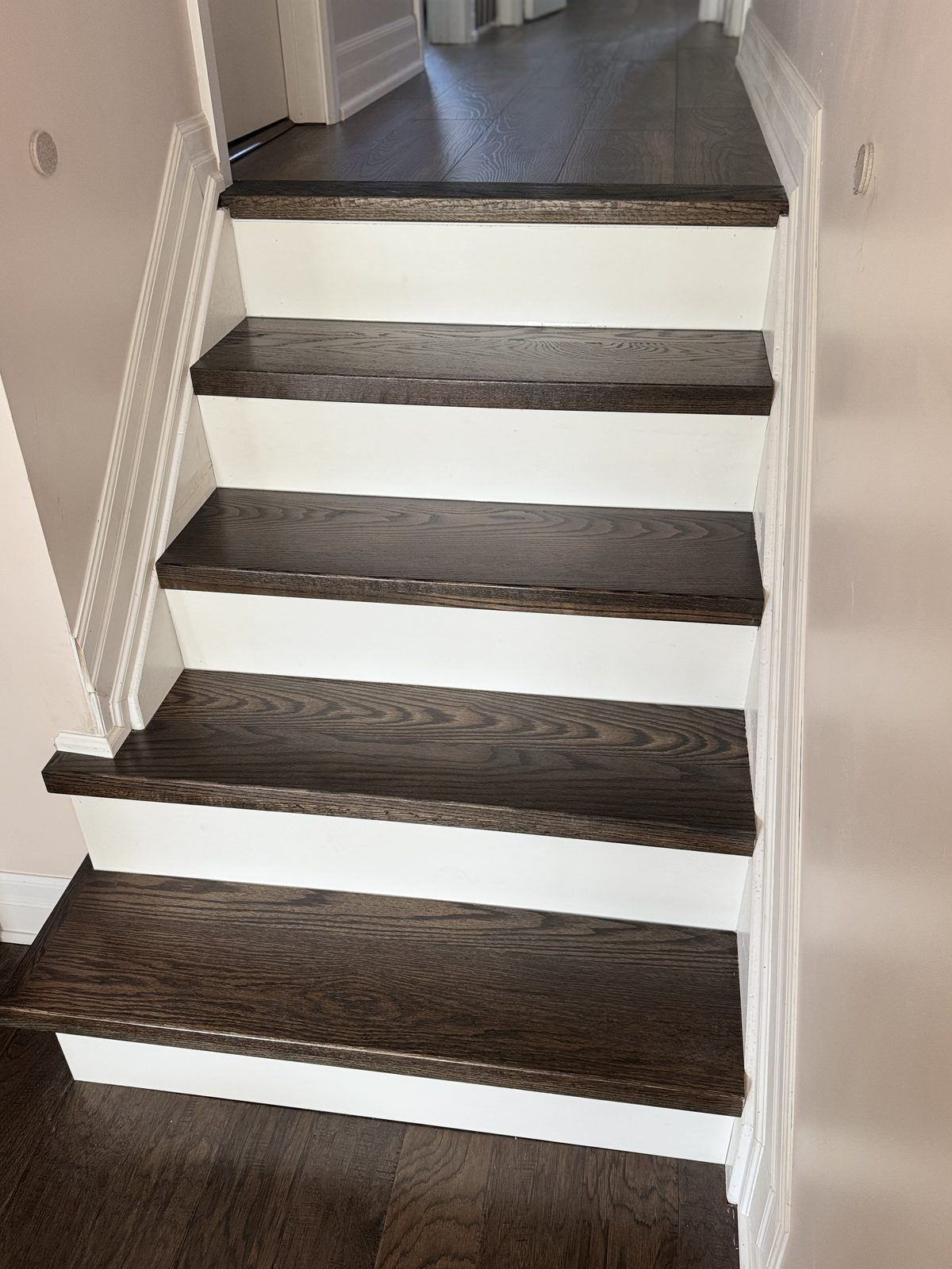 Stained treads, white risers